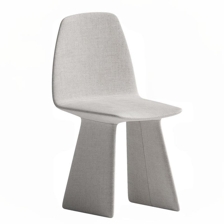 Modern Prisma Chair with geometric sculptural design and upholstered seat in neutral fabric