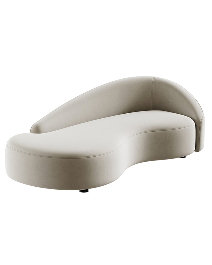 Curvana Sofa in soft neutral fabric with organic curved design and contemporary silhouette.