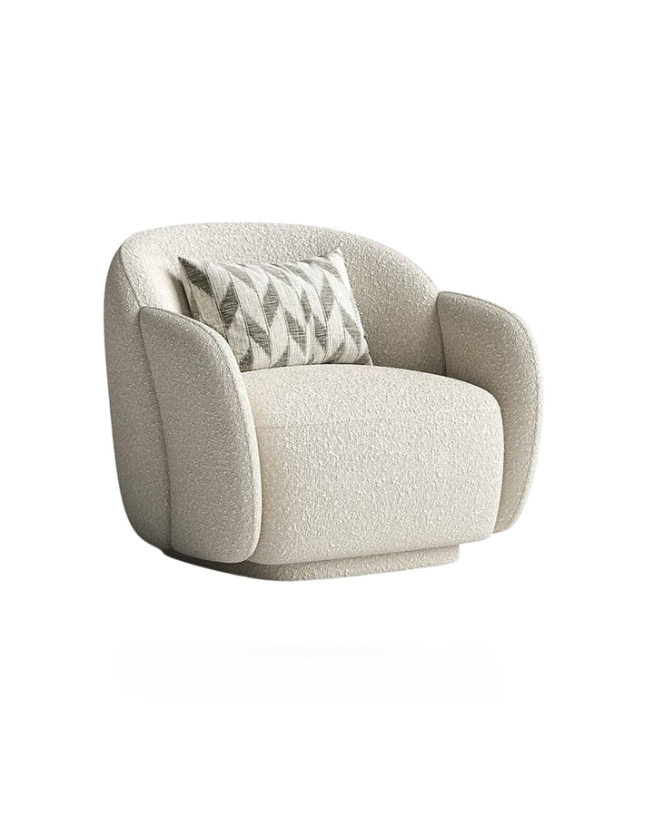 Side angle of Deylan Armchair – contemporary rounded design with upholstered arms