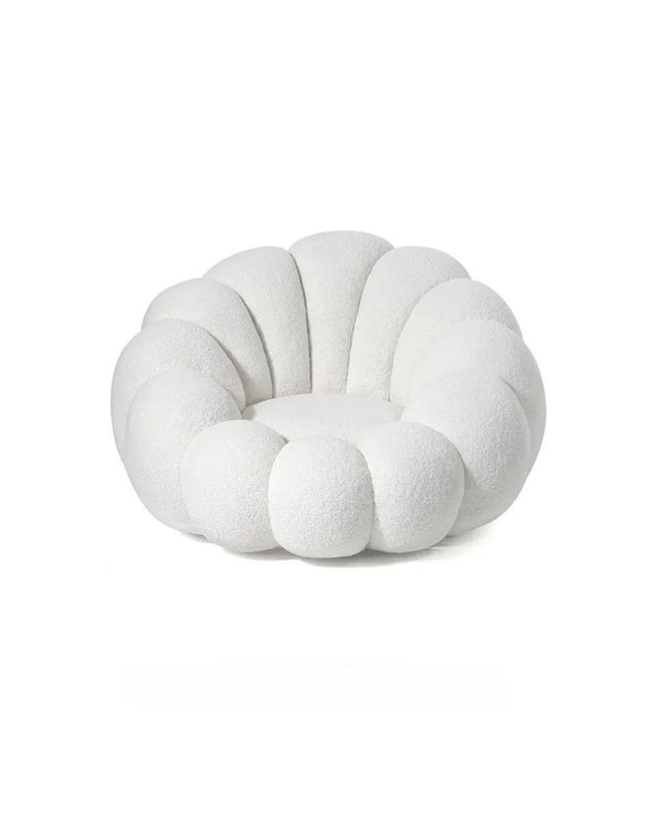 Luxury cloud-inspired boucle armchair with sculptural design