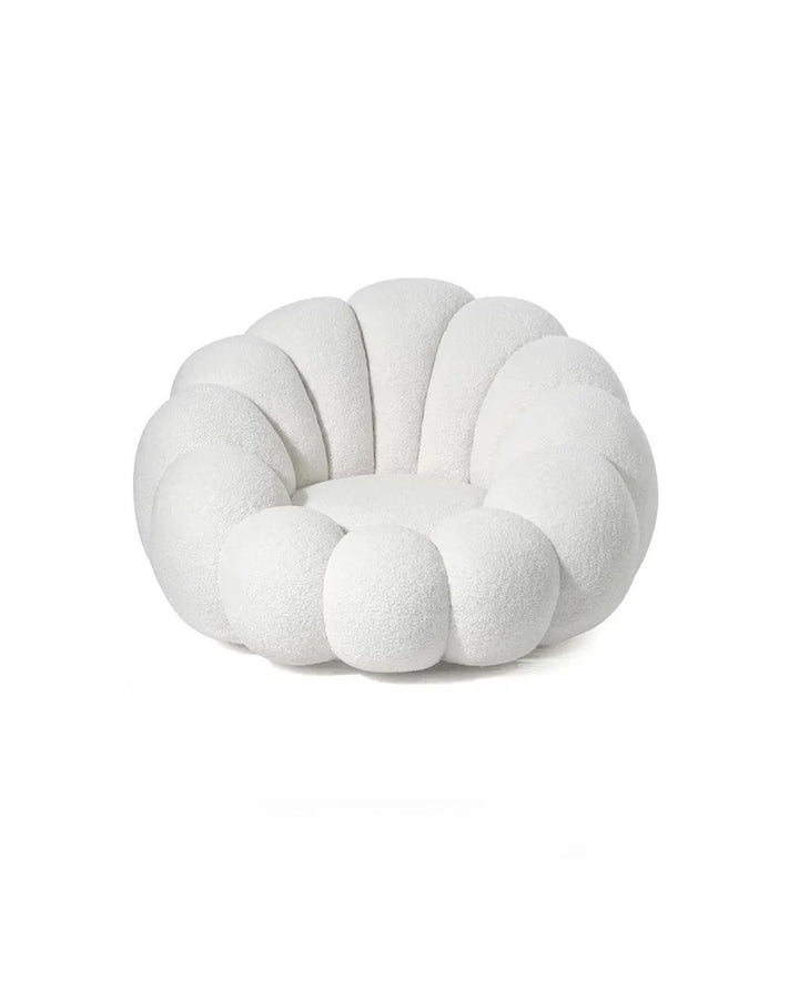 Luxury cloud-inspired boucle armchair with sculptural design