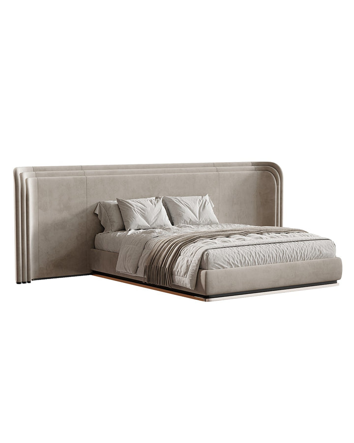 Luxury upholstered bed with layered headboard and elegant design by INSIDE HOME