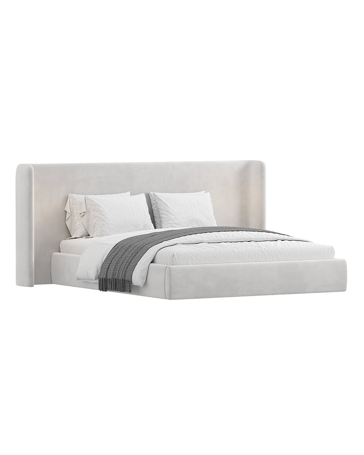 Minimalist upholstered bed with curved headboard – Linea Bed by INSIDE HOME.