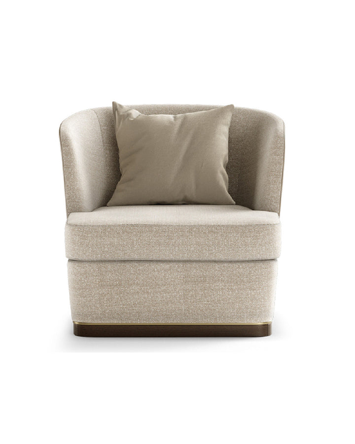 Modern beige armchair front view with leather back and gold accent - INSIDE HOME.