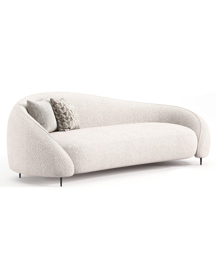 Minimalist cream-colored sofa with soft curved backrest and smooth contours, modern luxury style – LIVIA Sofa.
