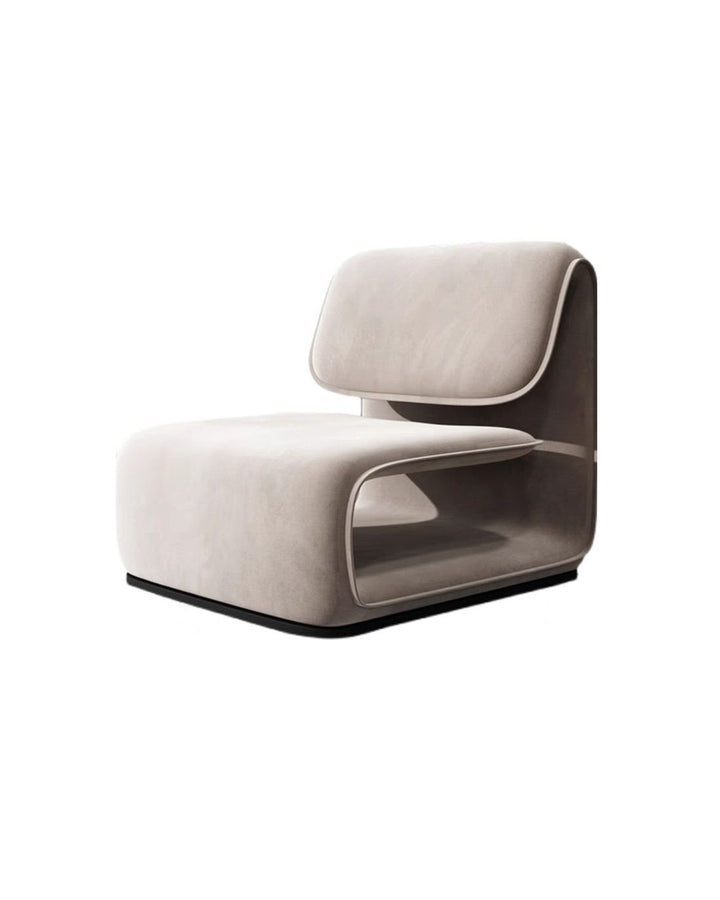 Lunaris Armchair side view, contemporary luxury armchair showcasing sleek curved lines and artistic modern design by INSIDE HOME.