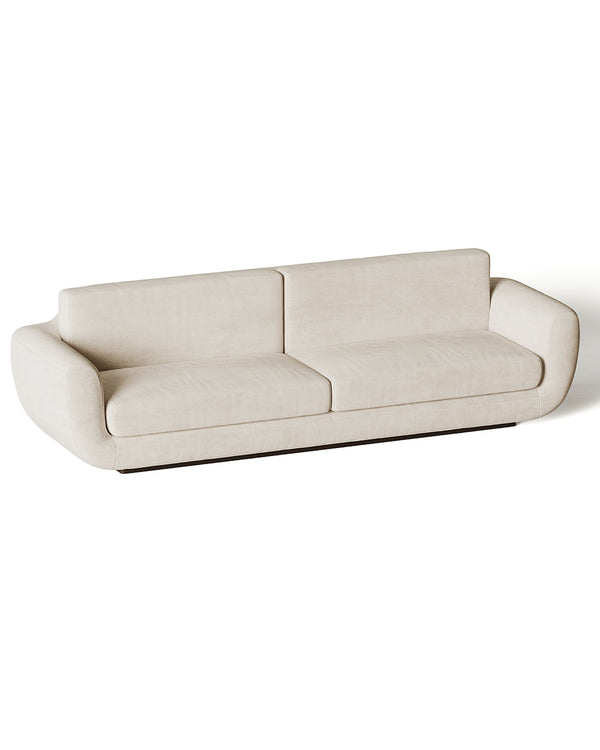 Elegant CALISTA Sofa with soft beige fabric and curved minimalist design – INSIDE HOME