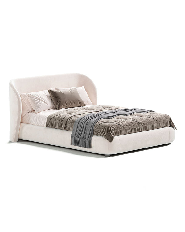 Modern upholstered bed with curved embracing headboard in soft beige fabric, designed for comfort and elegance.