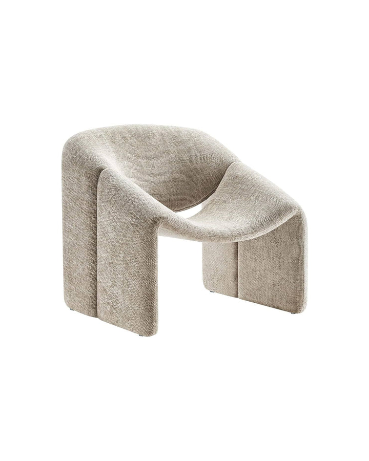 Side view of Regalis Armchair – artistic contemporary chair with unique curved structure.