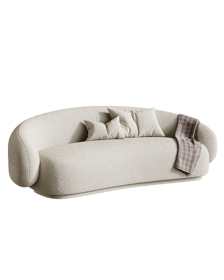 The CALMARE Sofa is the embodiment of serenity and refined comfort. With its smooth curves and organic flow, it creates a sense of balance and relaxation in any modern living space. Upholstered in premium fabric with a plush, cloud-like texture, CALMARE offers both elegance and unmatched comfort, making it the perfect centerpiece for luxury interiors.