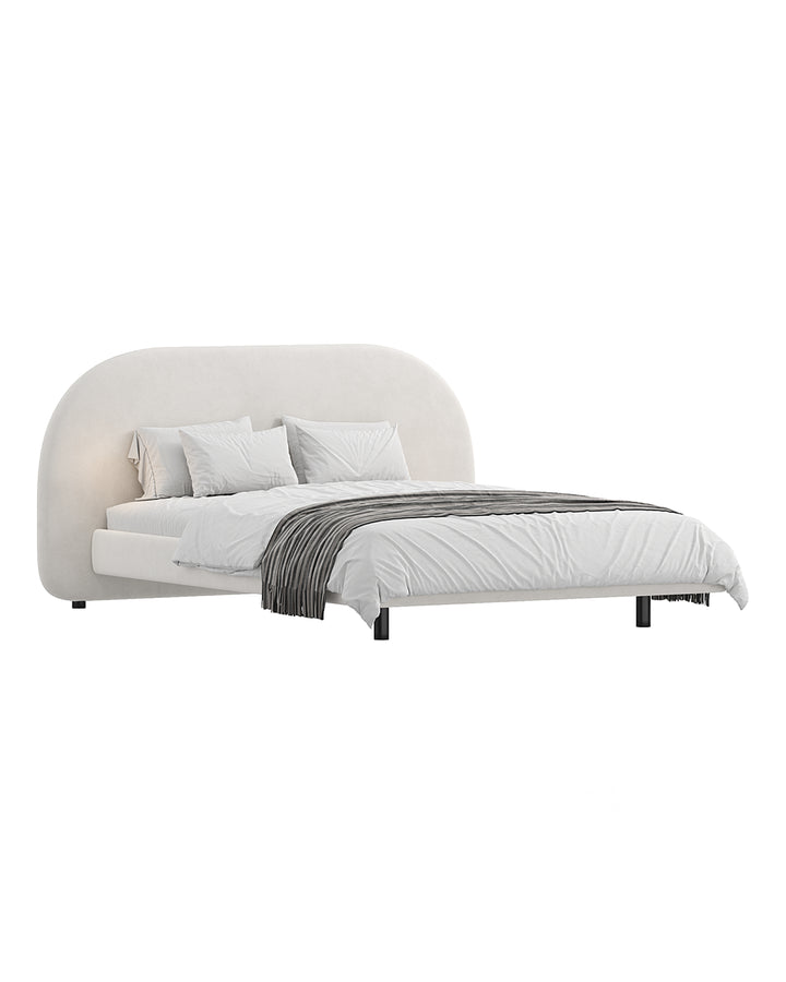 Ellipse Bed with soft rounded headboard in modern minimalist design by INSIDE HOME.
