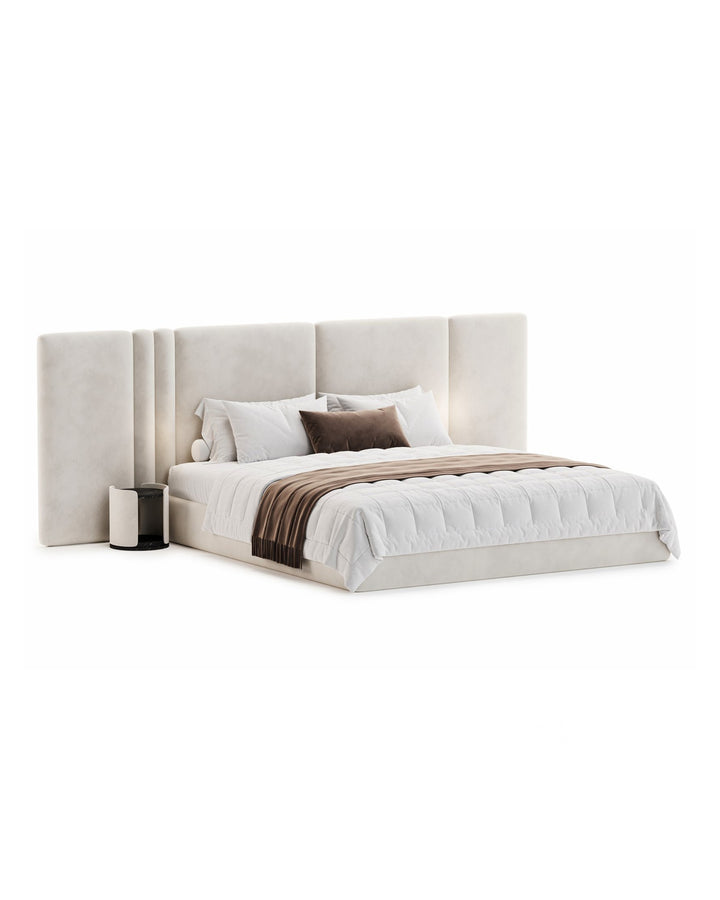 Luxury Magnifica Bed with tall upholstered headboard in soft beige fabric, styled with premium bedding.