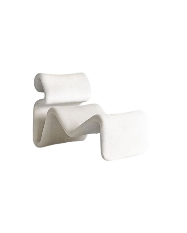 Side view of Imperium Armchair highlighting artistic silhouette and premium texture