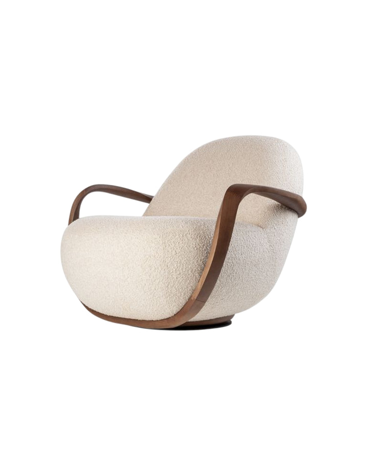 Luxury Curvia Armchair with curved wooden arms and rounded upholstered seat