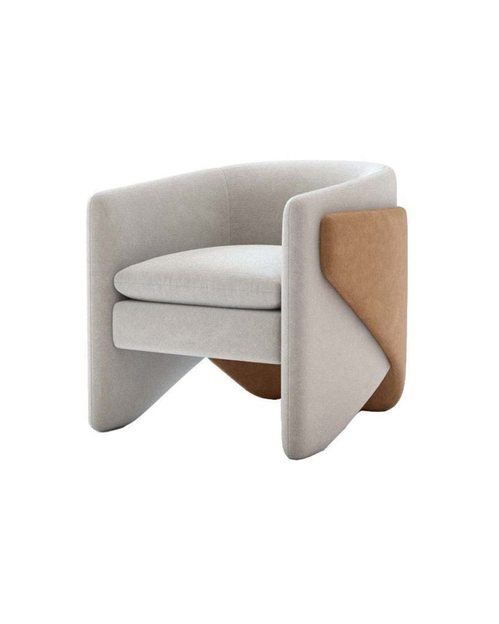 Side view of Origami Armchair highlighting its sculptural silhouette and layered folds