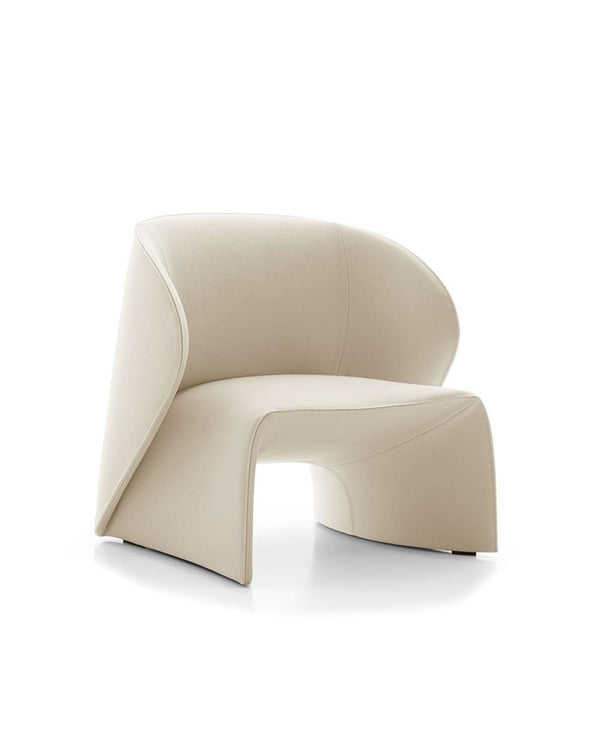 Front view of Avellino Armchair with elegant sculptural silhouette