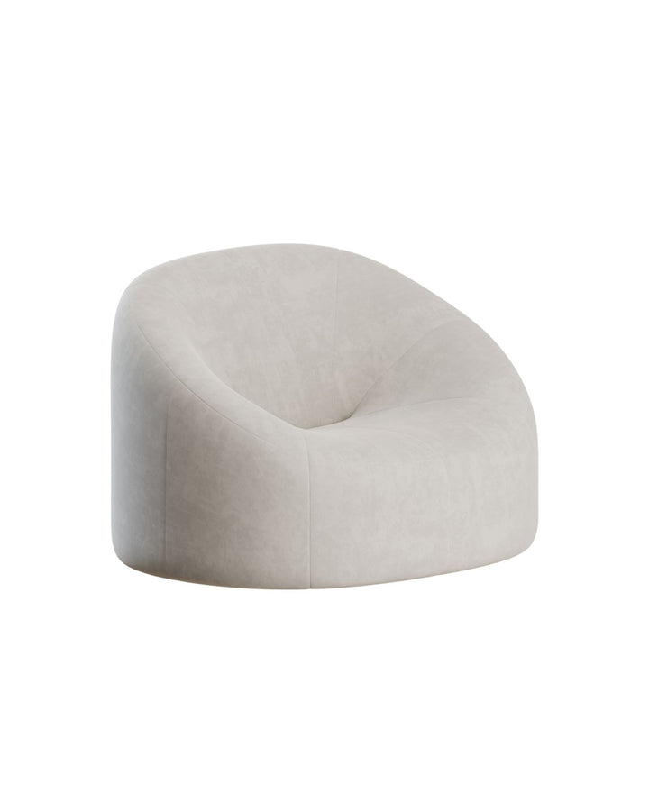 Side view of Ovale Armchair showing elegant oval curves and modern sculptural profile – INSIDE HOME