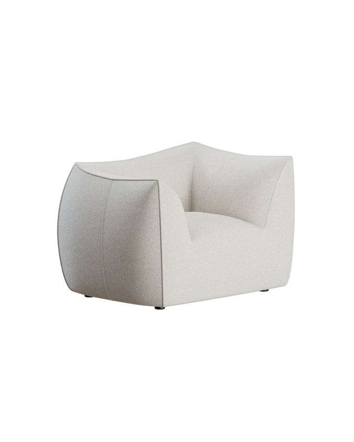 Geometra Armchair in light beige fabric with sculptural geometric design and angular lines, luxury seating by INSIDE HOME.