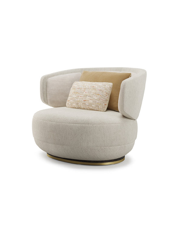 Sereno Armchair side view – luxury modern armchair with curved silhouette and gold accent base by INSIDE HOME.
