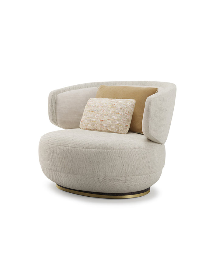 Sereno Armchair side view – luxury modern armchair with curved silhouette and gold accent base by INSIDE HOME.