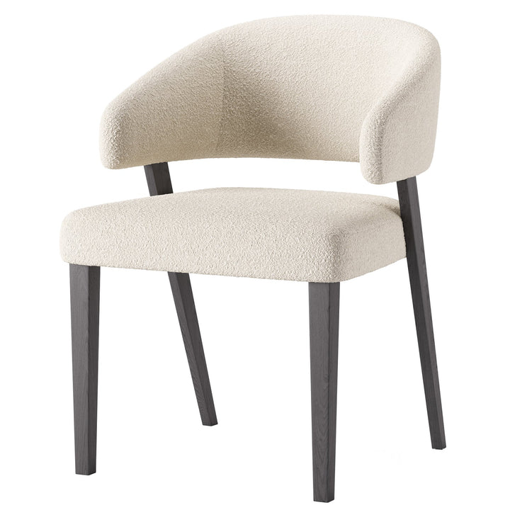 Modern upholstered dining chair with curved backrest and minimalist design – Forma Chair by INSIDE HOME.