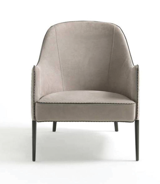 Elvio Armchair front view – modern armchair with slim metallic legs by INSIDE HOME.
