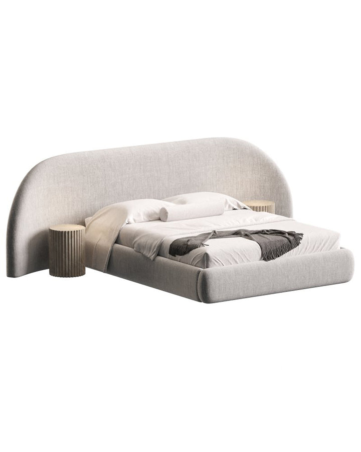 Arco Bed with elegant arched upholstered headboard and refined modern design by INSIDE HOME.
