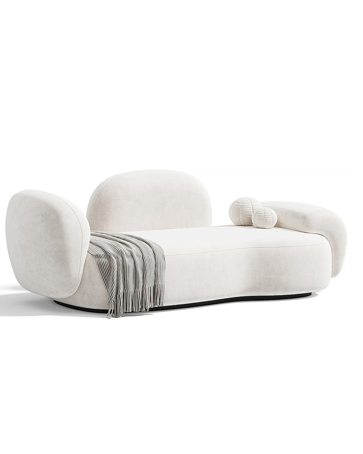 Luxury VOLUTA Sofa with sculptural curved design, rounded armrests, and modern upholstered finish