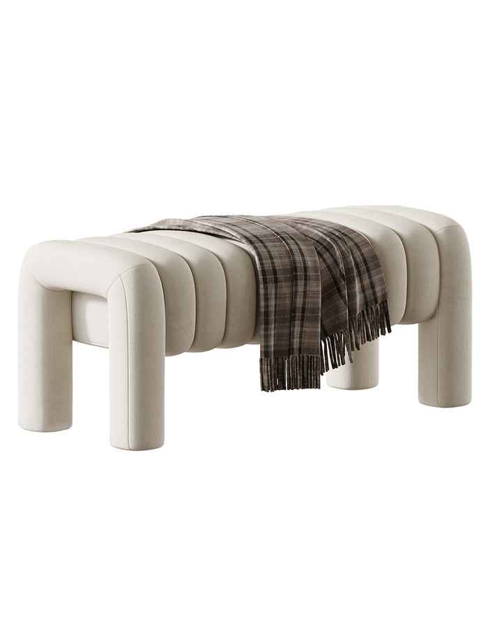 SEGMENTA banquette in soft neutral fabric with bold tubular segmented design by INSIDE HOME.