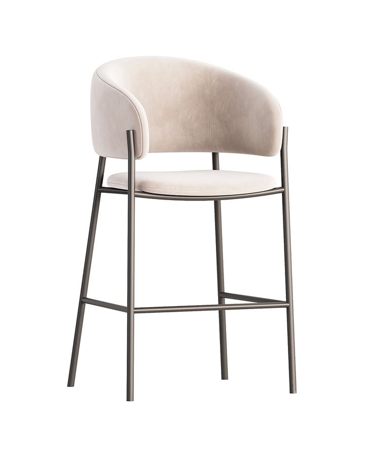 TONERA bar chair with curved upholstered backrest, soft beige fabric, and slim metallic frame by INSIDE HOME.