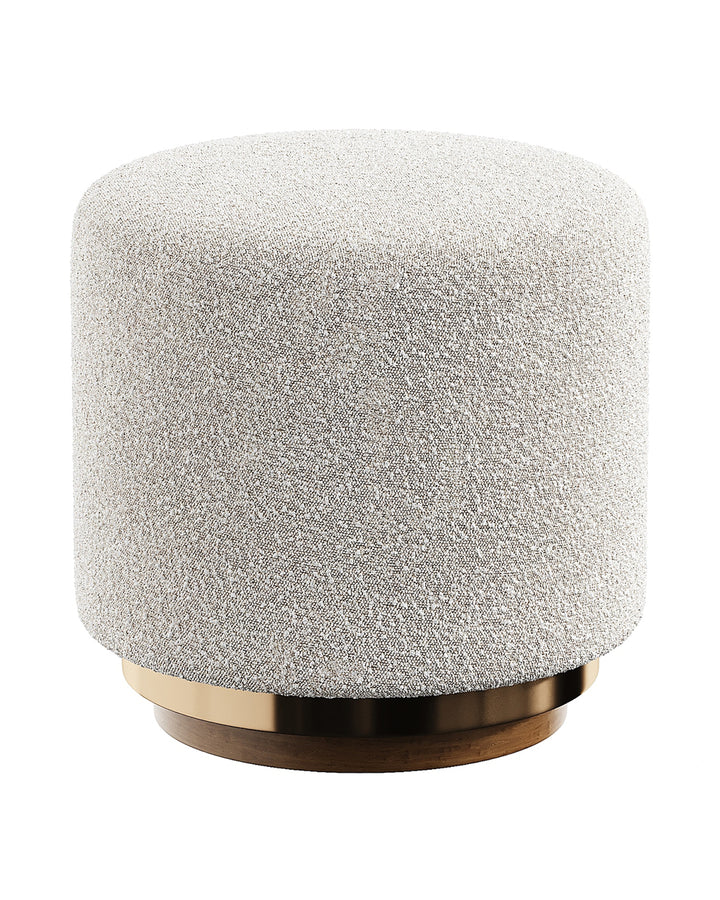 Round buff with smooth upholstery and metallic base accent.