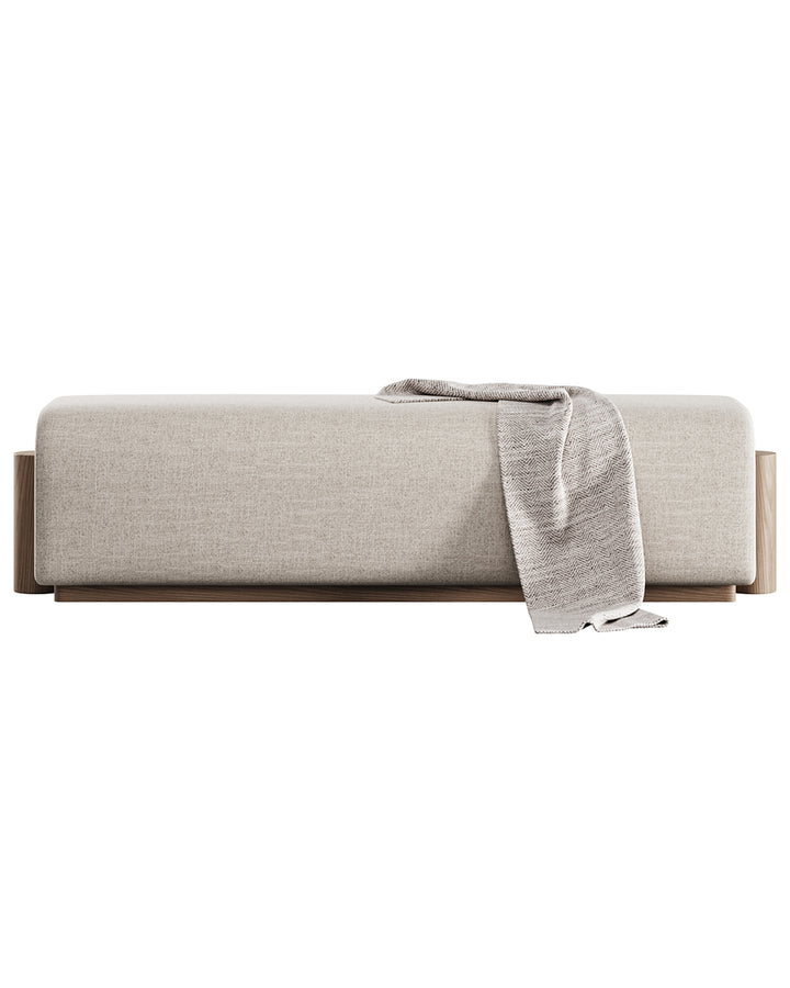 QUADRA banquette in soft neutral fabric with wooden base and side details by INSIDE HOME.