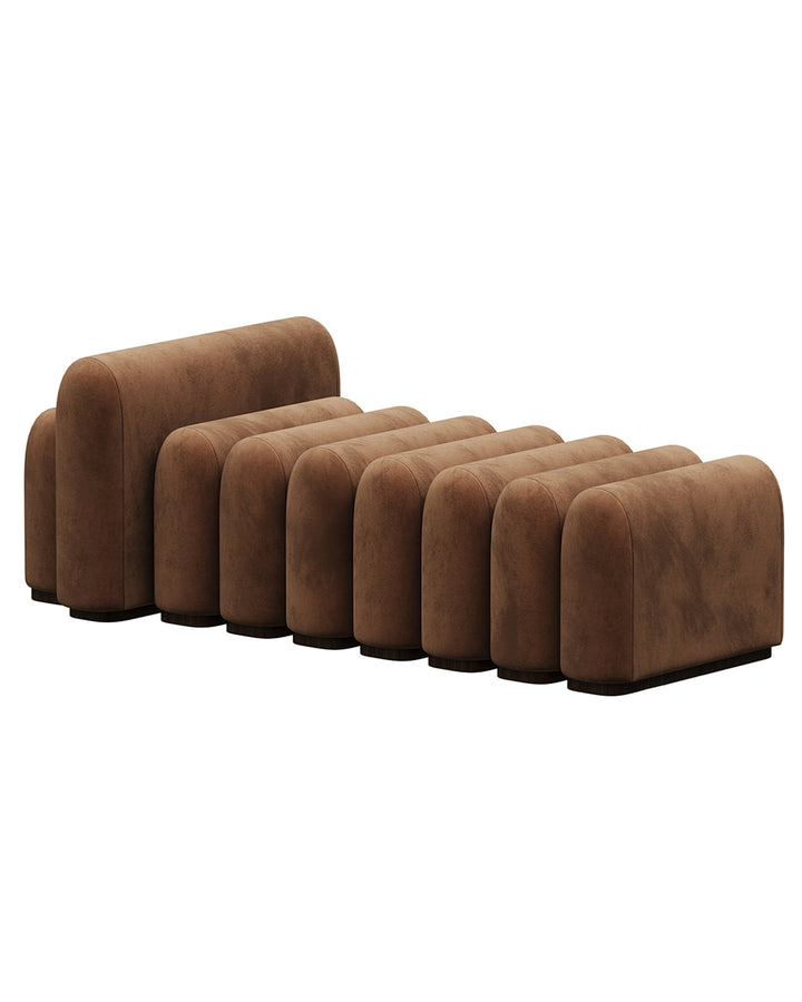 Luxury modular banquette in brown velvet with sculptural design and rhythmic segments – INSIDE HOME.